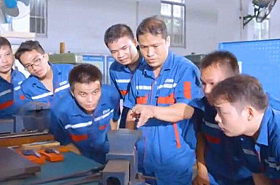 玉柴模具烙匠心 覃懋华的“精确之美”